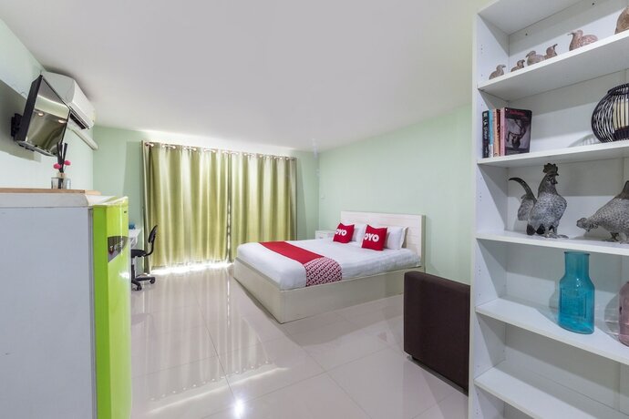 Imagen de la habitación del Hotel Oyo 75363 V Place Apartment. Foto 19