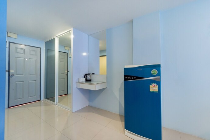 Imagen de la habitación del Hotel Oyo 75363 V Place Apartment. Foto 20