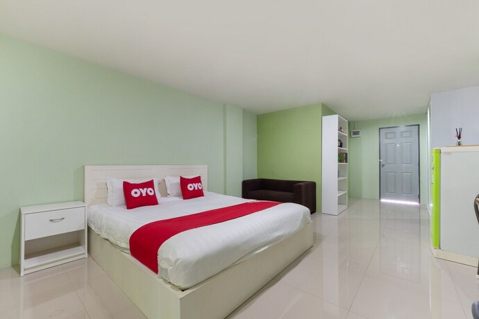 Imagen de la habitación del Hotel Oyo 75363 V Place Apartment. Foto 22