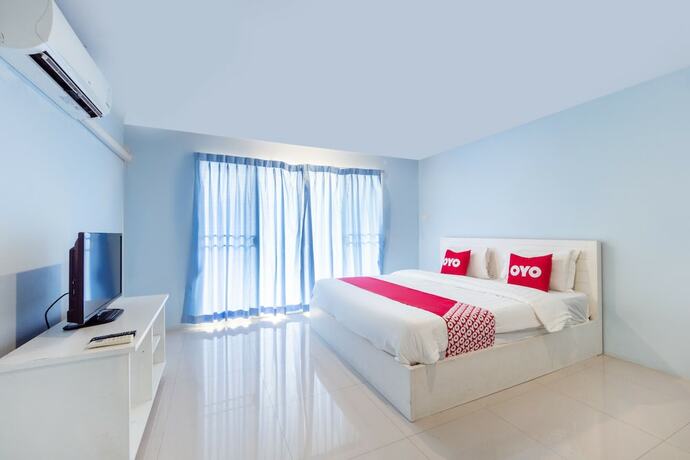 Imagen de la habitación del Hotel Oyo 75363 V Place Apartment. Foto 25