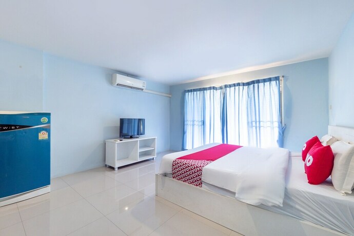 Imagen de la habitación del Hotel Oyo 75363 V Place Apartment. Foto 26