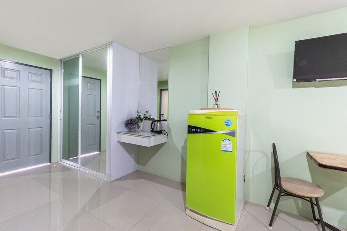 Imagen de la habitación del Hotel Oyo 75363 V Place Apartment. Foto 27
