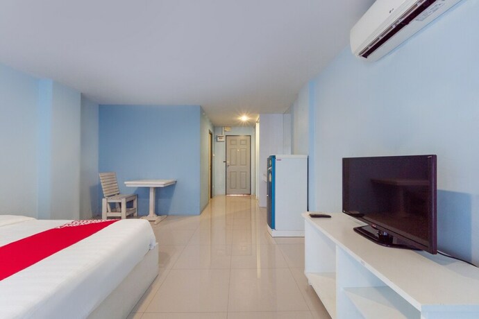 Imagen de la habitación del Hotel Oyo 75363 V Place Apartment. Foto 32