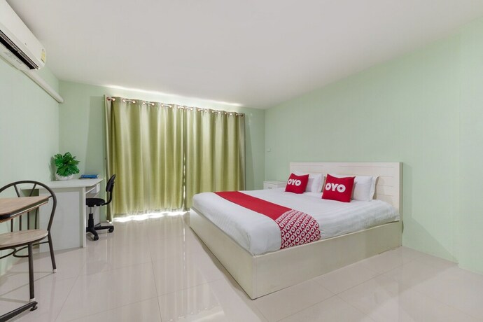 Imagen de la habitación del Hotel Oyo 75363 V Place Apartment. Foto 34