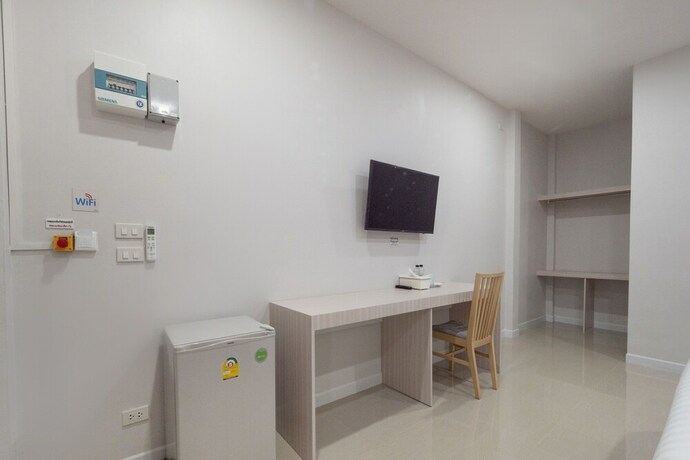 Imagen de la habitación del Hotel Oyo 75378 Thawapee Resort. Foto 25