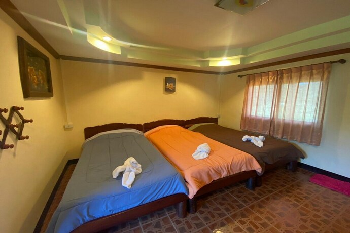 Imagen de la habitación del Hotel Oyo 75380 Bannoichynum Resort Kanchanaburi. Foto 34