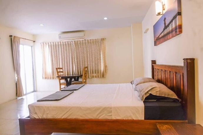 Imagen de la habitación del Hotel Oyo 75398 The Wanna Pattaya. Foto 4