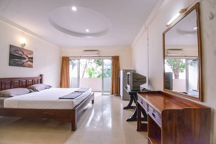 Imagen de la habitación del Hotel Oyo 75398 The Wanna Pattaya. Foto 11