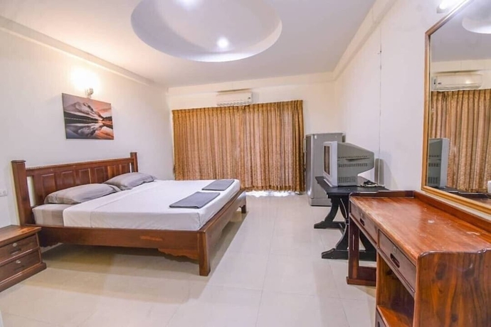 Imagen de la habitación del Hotel Oyo 75398 The Wanna Pattaya. Foto 12