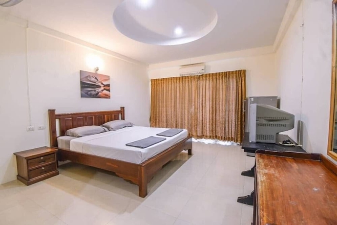Imagen de la habitación del Hotel Oyo 75398 The Wanna Pattaya. Foto 14