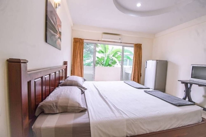 Imagen de la habitación del Hotel Oyo 75398 The Wanna Pattaya. Foto 15