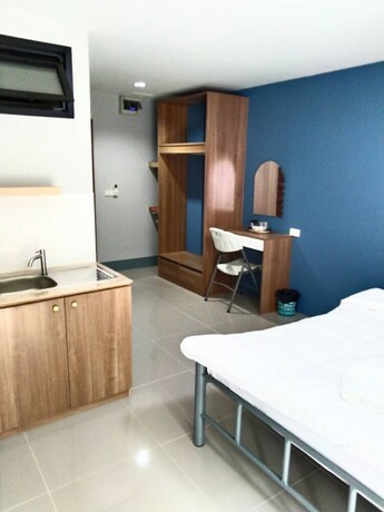 Imagen de la habitación del Hotel Oyo 75403 Dinosaur Apartment. Foto 8