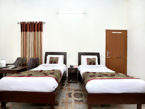 Imagen de la habitación del Hotel Oyo 7609 Dolphin. Foto 17