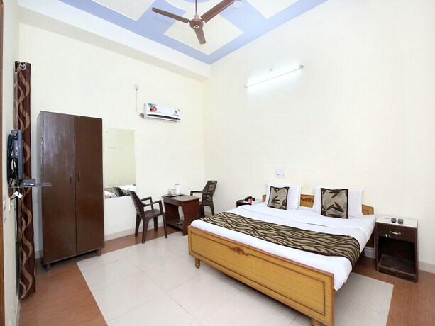 Imagen de la habitación del Hotel Oyo 7609 Dolphin. Foto 18