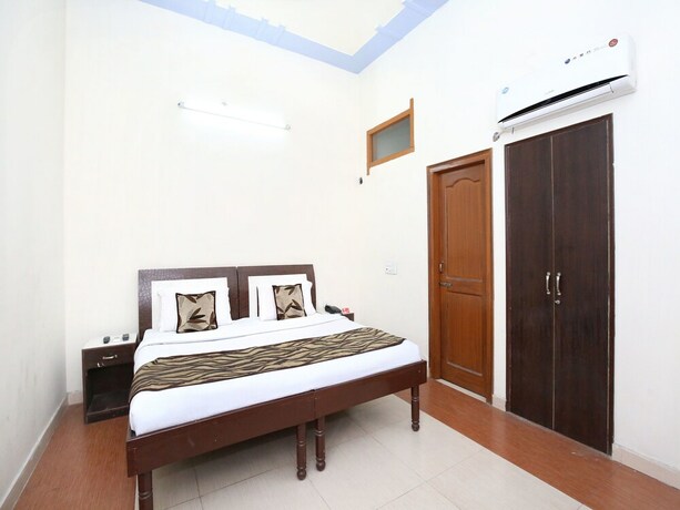 Imagen de la habitación del Hotel Oyo 7609 Dolphin. Foto 19