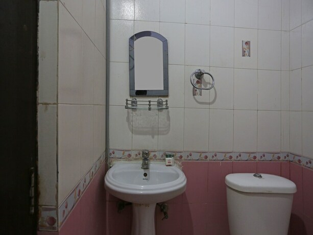 Imagen de la habitación del Hotel Oyo 7636 Kaushalya Residency. Foto 10