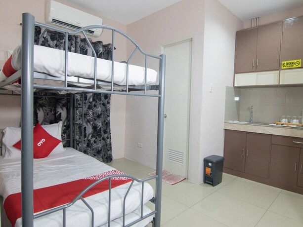 Imagen de la habitación del Hotel Oyo 766 Ichehan Apartments. Foto 22