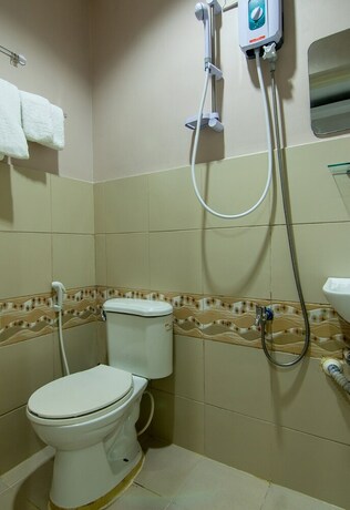 Imagen de la habitación del Hotel Oyo 766 Ichehan Apartments. Foto 30