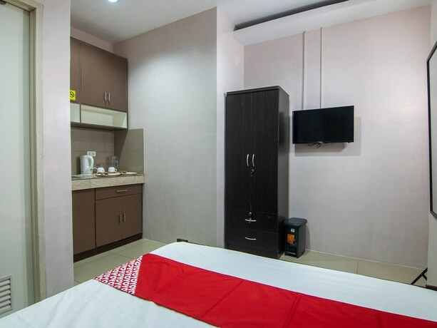 Imagen de la habitación del Hotel Oyo 766 Ichehan Apartments. Foto 32