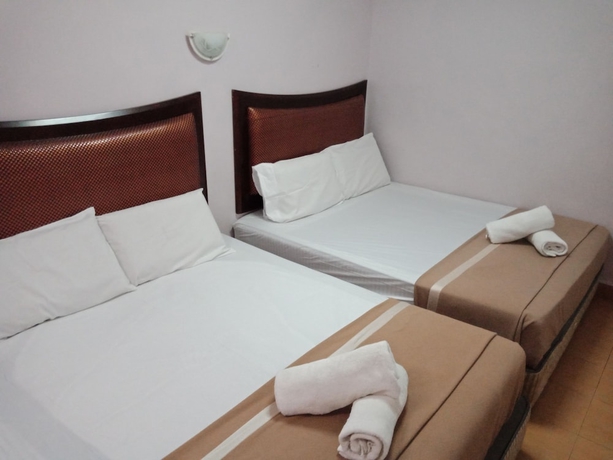 Imagen de la habitación del Hotel Oyo 766 Times Inn. Foto 2