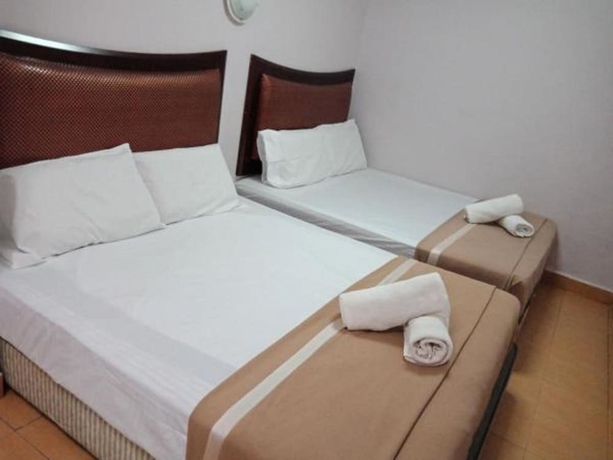 Imagen de la habitación del Hotel Oyo 766 Times Inn. Foto 3