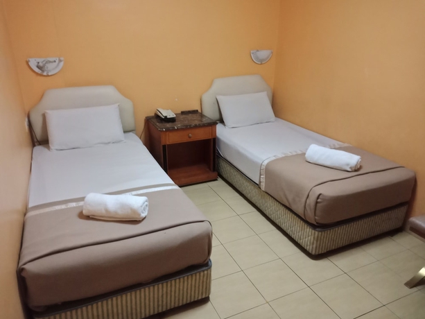 Imagen de la habitación del Hotel Oyo 766 Times Inn. Foto 8