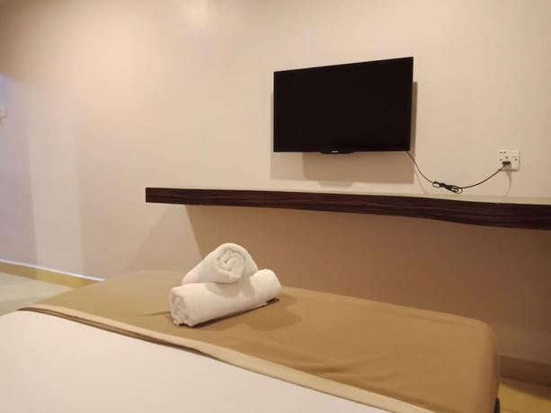Imagen de la habitación del Hotel Oyo 766 Times Inn. Foto 14