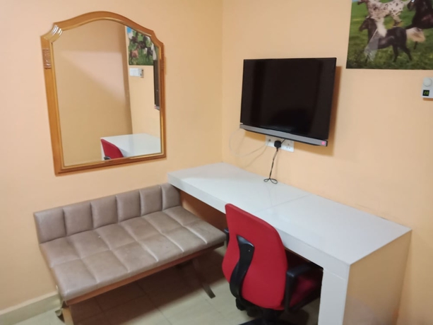 Imagen de la habitación del Hotel Oyo 766 Times Inn. Foto 15