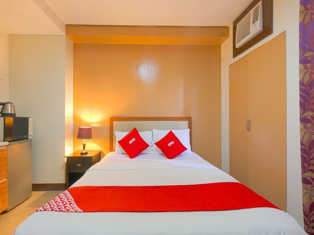 Imagen de la habitación del Hotel Oyo 769 Poblacion Suites Polaris. Foto 13