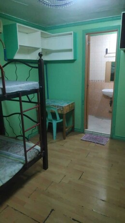 Imagen de la habitación del Hotel Oyo 772 Remedios Apartment. Foto 20