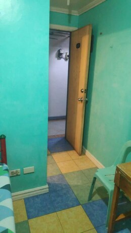 Imagen de la habitación del Hotel Oyo 772 Remedios Apartment. Foto 23