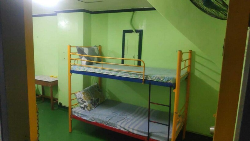 Imagen de la habitación del Hotel Oyo 772 Remedios Apartment. Foto 34