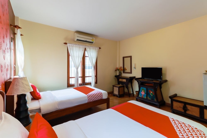 Imagen de la habitación del Hotel Oyo 780 Plumeria Home. Foto 3