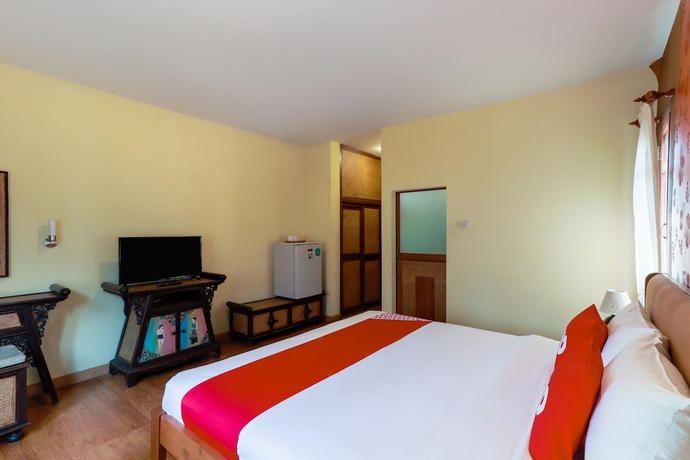 Imagen de la habitación del Hotel Oyo 780 Plumeria Home. Foto 5