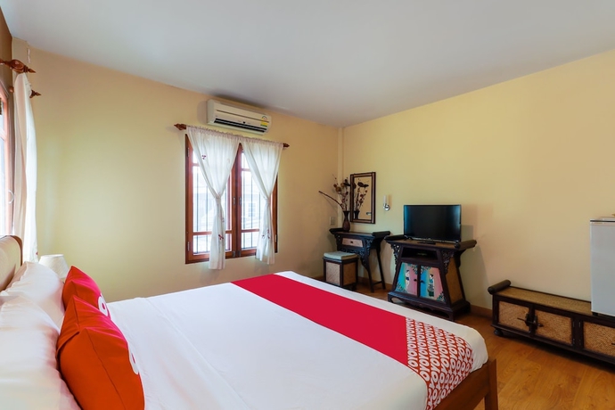 Imagen de la habitación del Hotel Oyo 780 Plumeria Home. Foto 9