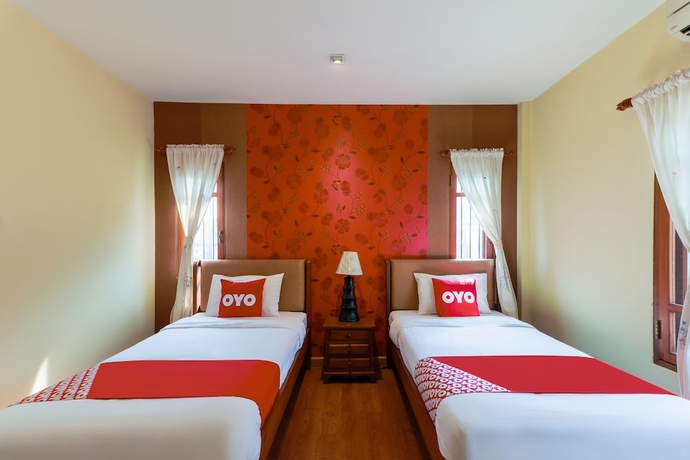 Imagen de la habitación del Hotel Oyo 780 Plumeria Home. Foto 10