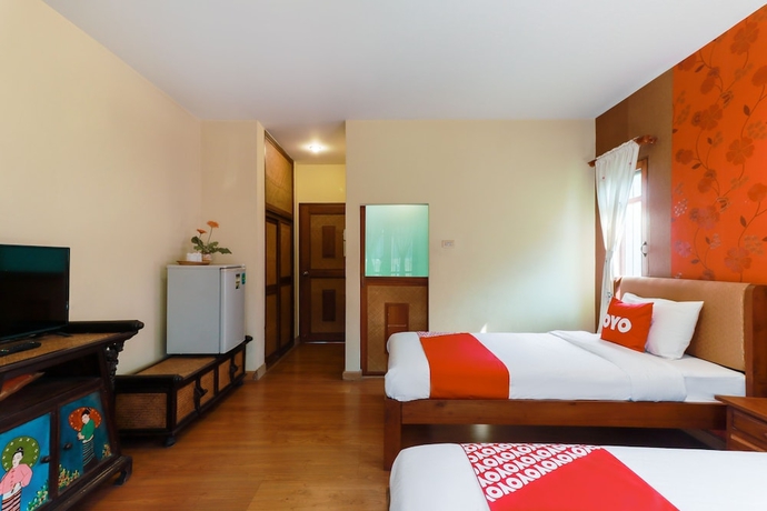 Imagen de la habitación del Hotel Oyo 780 Plumeria Home. Foto 11