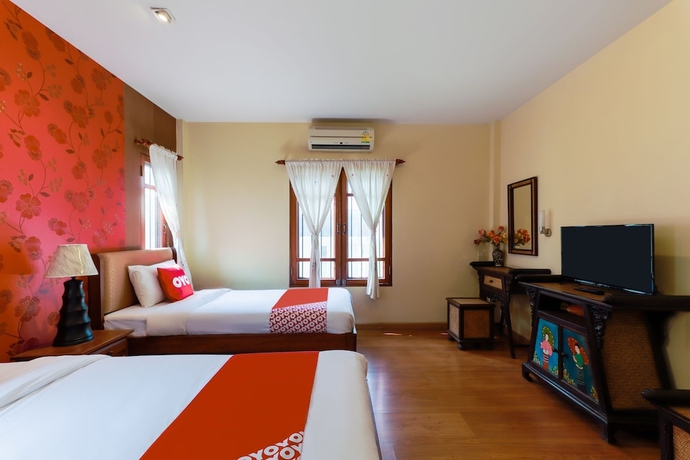 Imagen de la habitación del Hotel Oyo 780 Plumeria Home. Foto 12