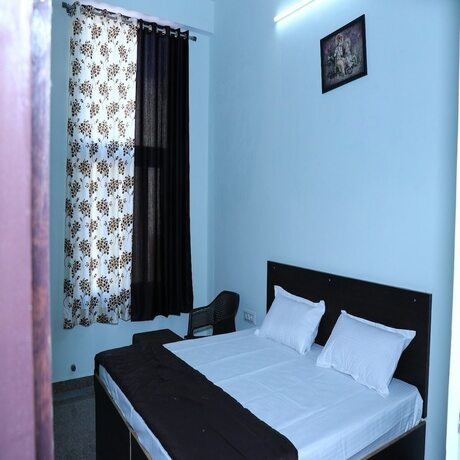 Imagen de la habitación del Hotel Oyo 7880 Navrang. Foto 14