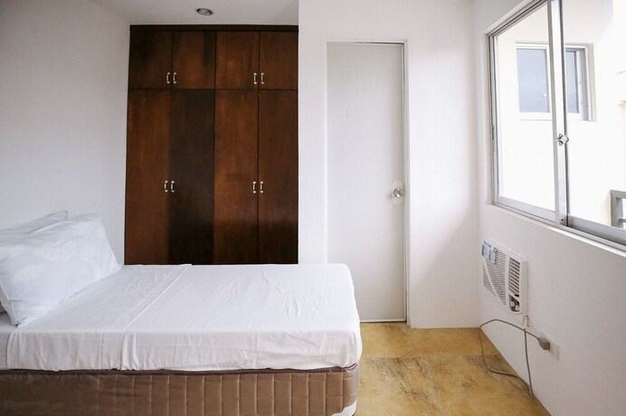 Imagen de la habitación del Hotel Oyo 789 Abn Residences. Foto 15