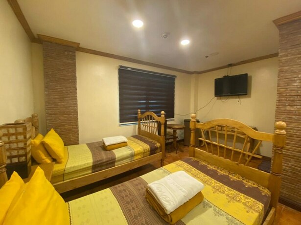 Imagen de la habitación del Hotel Oyo 797 Brickwood Suites. Foto 14