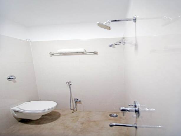Imagen de la habitación del Hotel Oyo 8173 Singh Palace. Foto 11