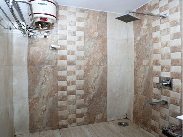 Imagen de la habitación del Hotel Oyo 8568 Kishan Villas. Foto 16
