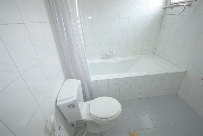 Imagen de la habitación del Hotel Oyo 859 Golden Land. Foto 10
