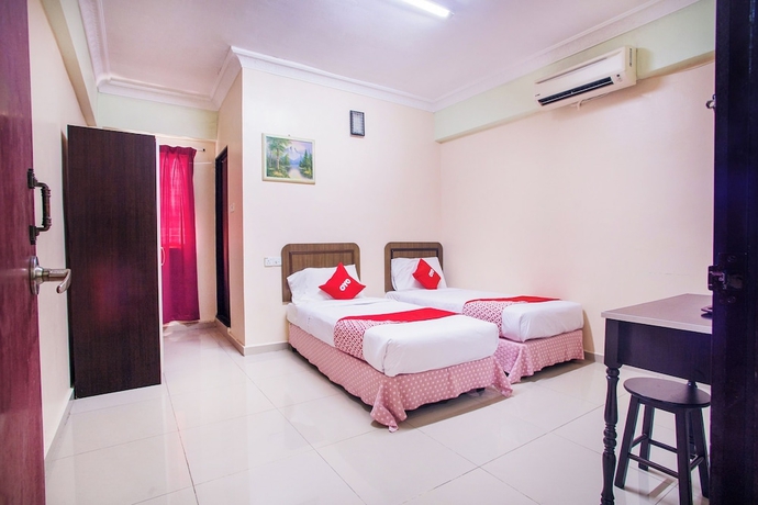 Imagen de la habitación del Hotel Oyo 89363 Casavilla. Foto 8