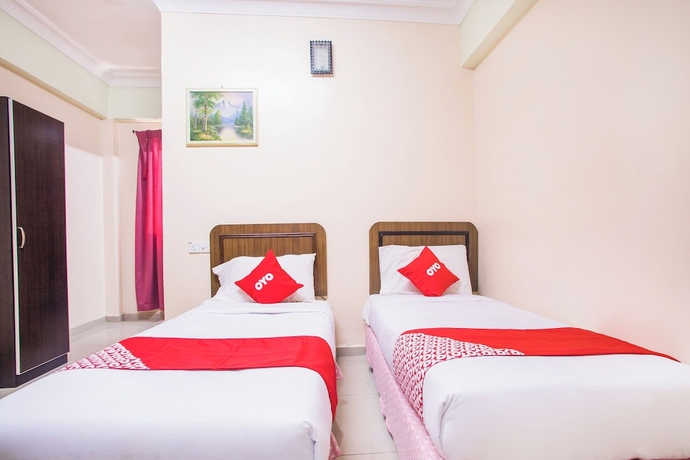 Imagen de la habitación del Hotel Oyo 89363 Casavilla. Foto 9