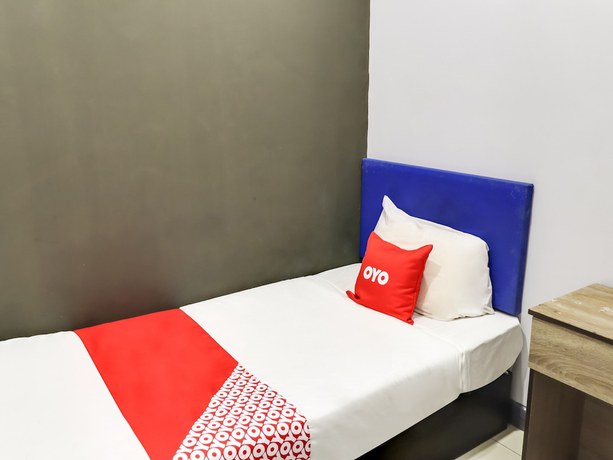 Imagen de la habitación del Hotel Oyo 89381 Moonnight. Foto 12