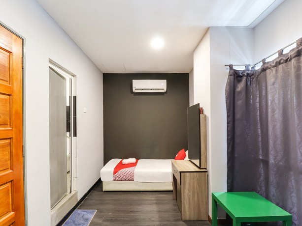 Imagen de la habitación del Hotel Oyo 89381 Moonnight. Foto 13