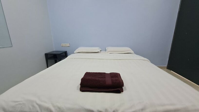 Imagen de la habitación del Hotel Oyo 89407 Ezi. Foto 4