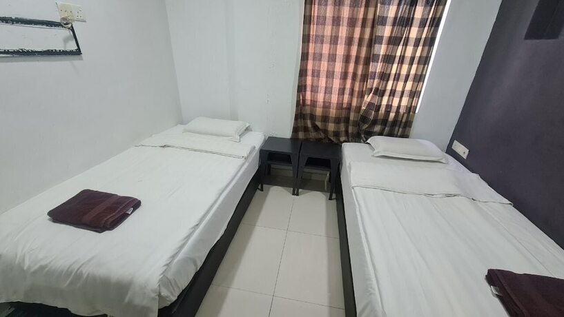 Imagen de la habitación del Hotel Oyo 89407 Ezi. Foto 9